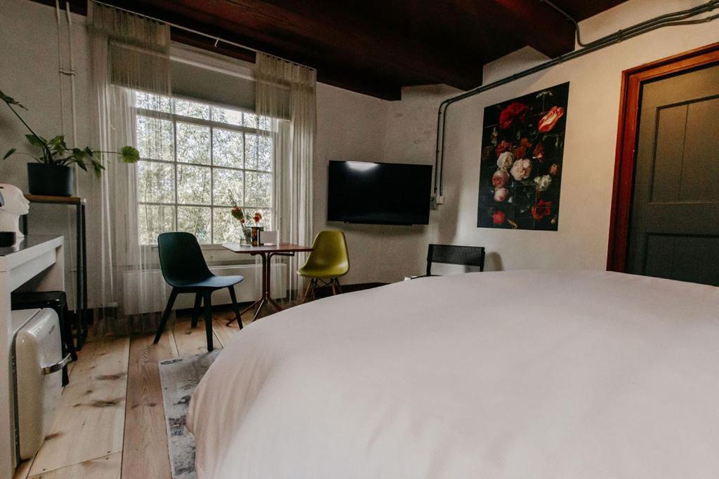 Hotel Slapen In De Molen Arkel Esterno foto
